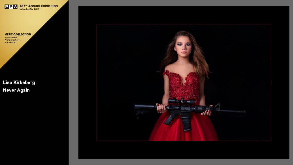 Young girl in red dress holding assault rifle