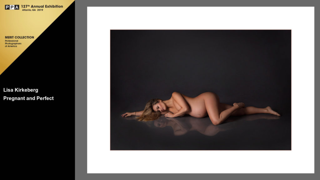 color photograph of nude pregnant woman lying on the ground
