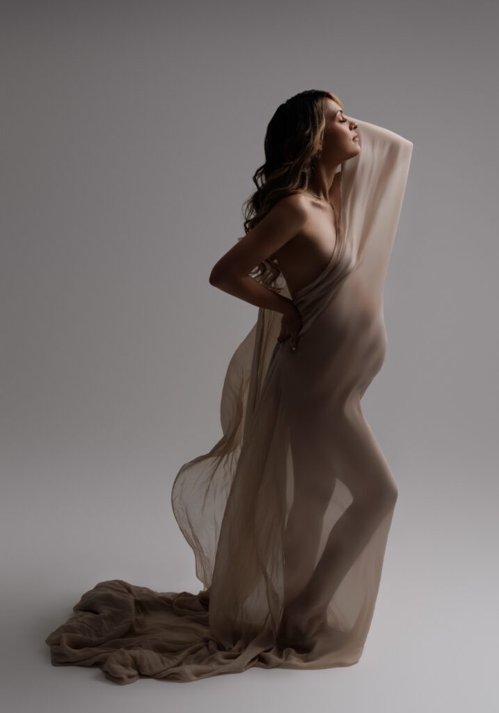 pregnant woman wrapped in silk