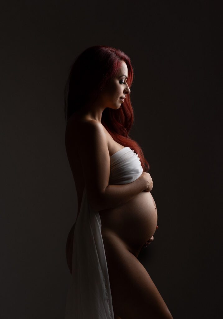 pregnant woman wearing silk with red hair